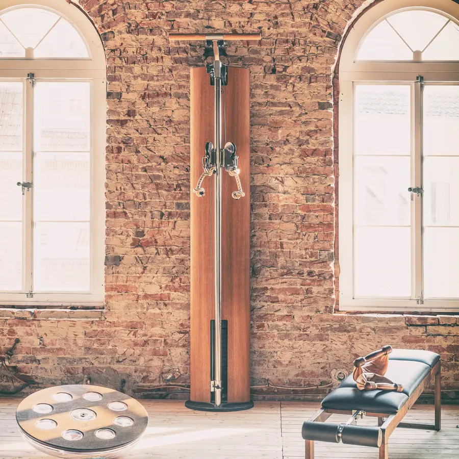 Kabeldragmaskin i trä Slimbeam För hemmaträning med snygg design 